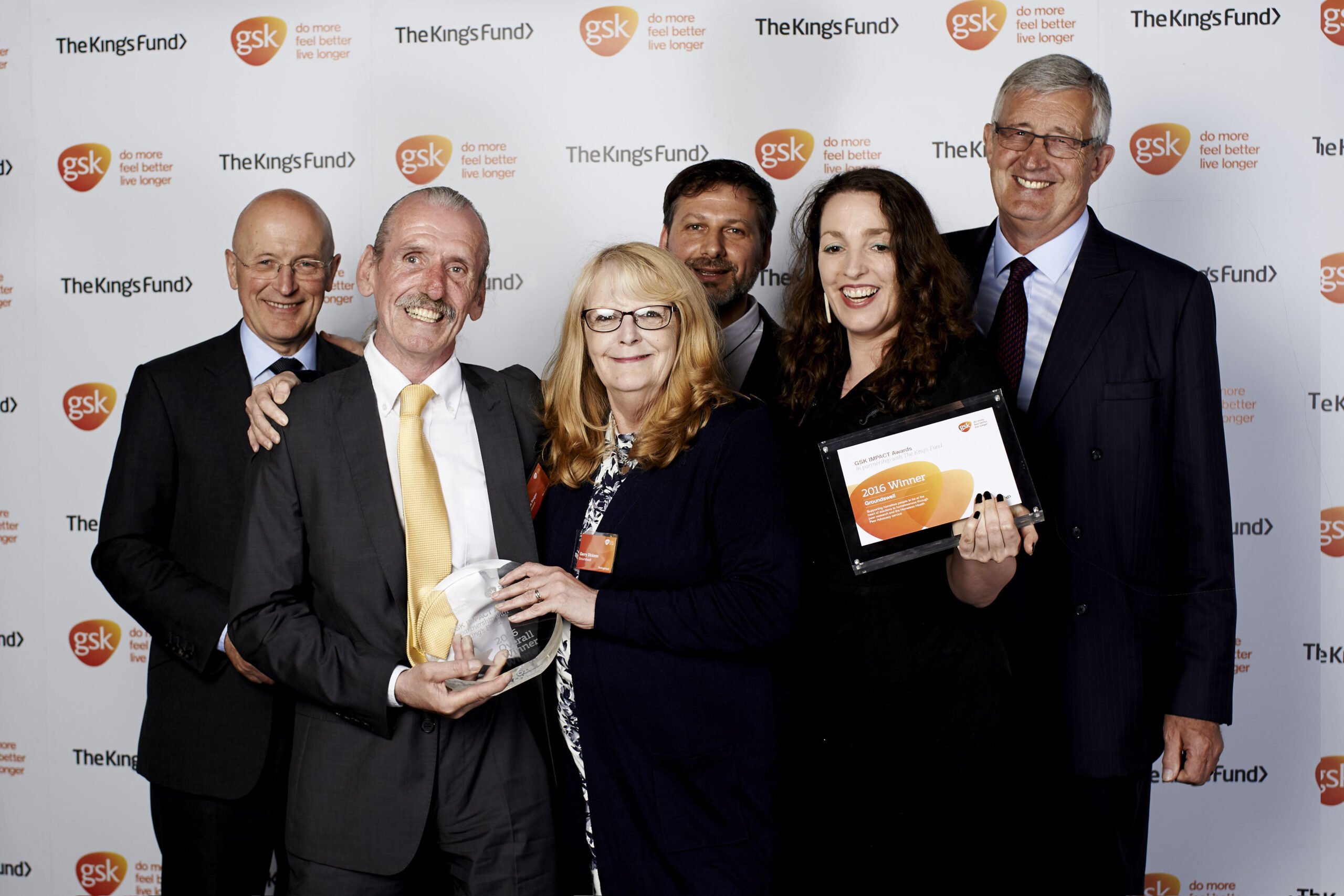 An image of Groundswell staff and volunteers winning the GSK impact award