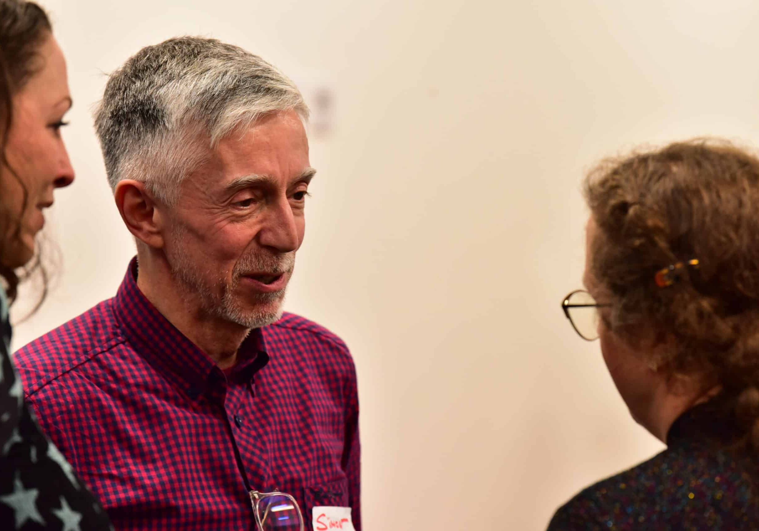 Simon Kate and staff in conversation